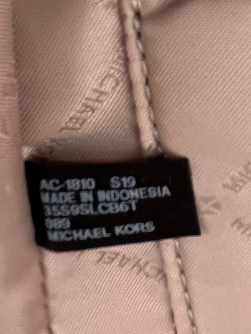 Michael Kors White Perforated Backpack with Black Trim - Picture 7 of 10
